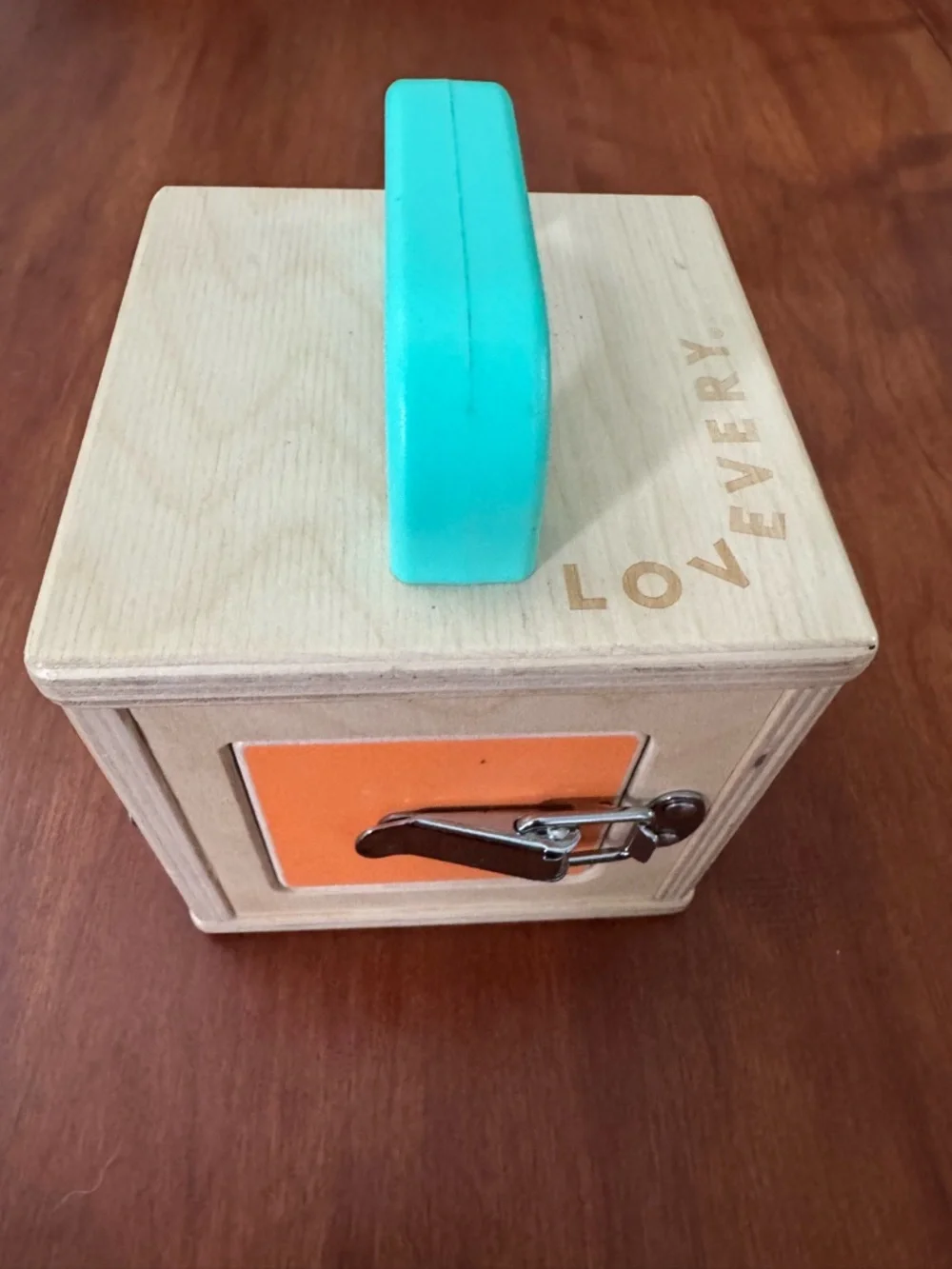 Lovevery Wooden Busy Box with Turquoise Handle